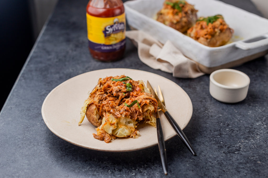 BBQ Pulled Pork Baked Potato – Sylvia's Soul Food Brand